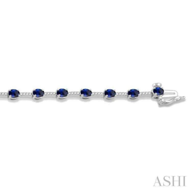 1/3 Ctw Round Cut Diamond & 4x3MM Oval Cut Sapphire Precious Bracelet in 10K White Gold