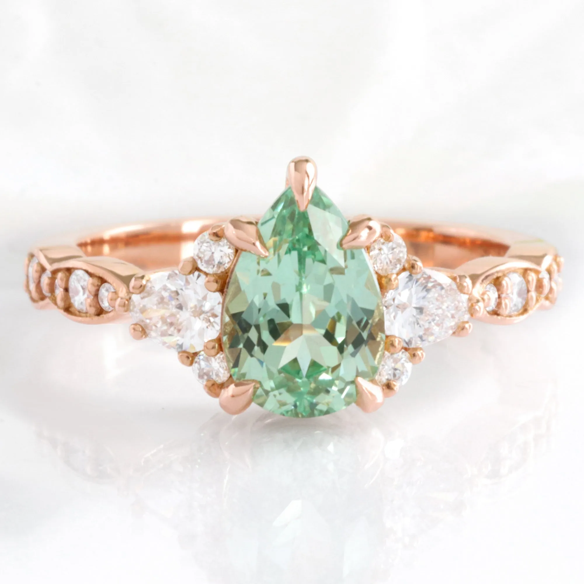 2.2 Ct. Pear Green Sapphire Ring in Dahlia 3 Stone Diamond Band