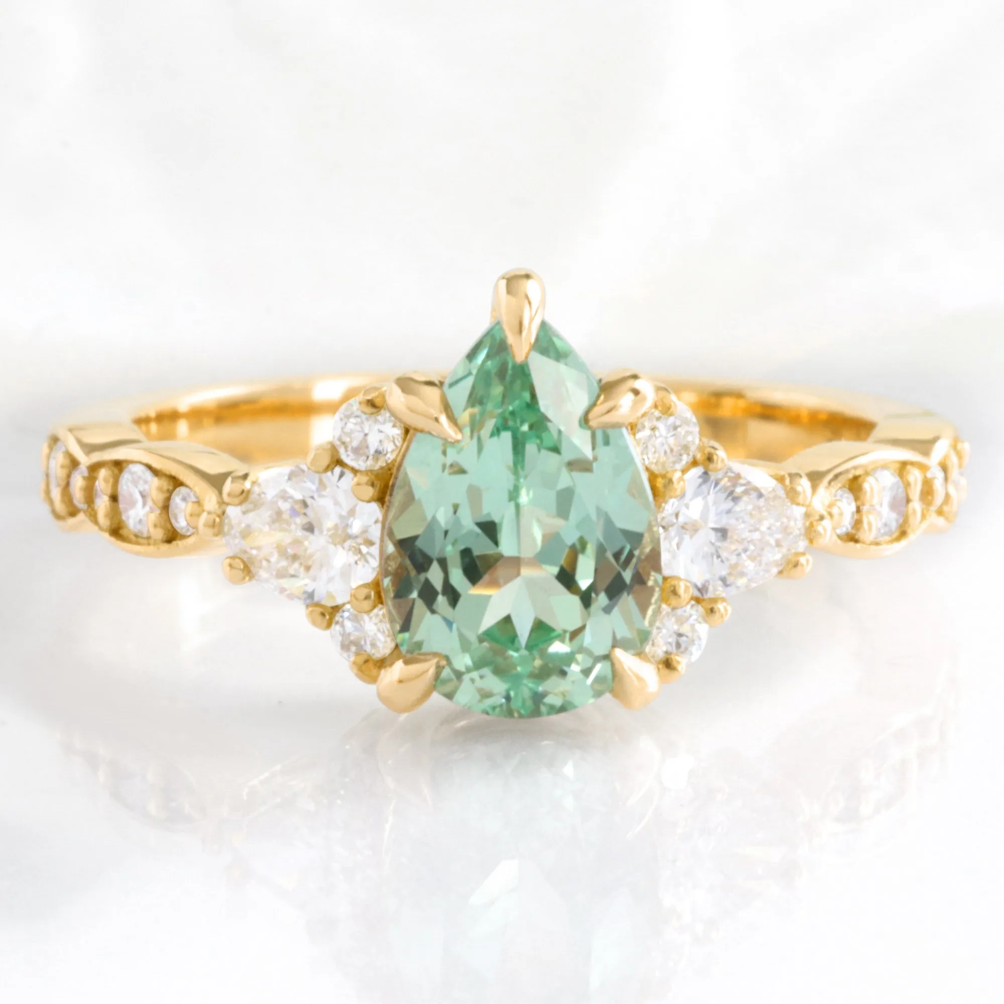 2.2 Ct. Pear Green Sapphire Ring in Dahlia 3 Stone Diamond Band