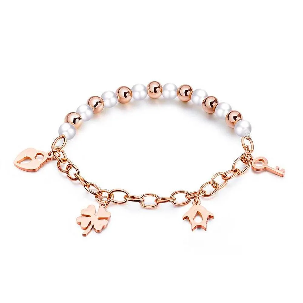 Boxed 18ct Rose Gold Charm Bracelet and Butterfly Earrings Set