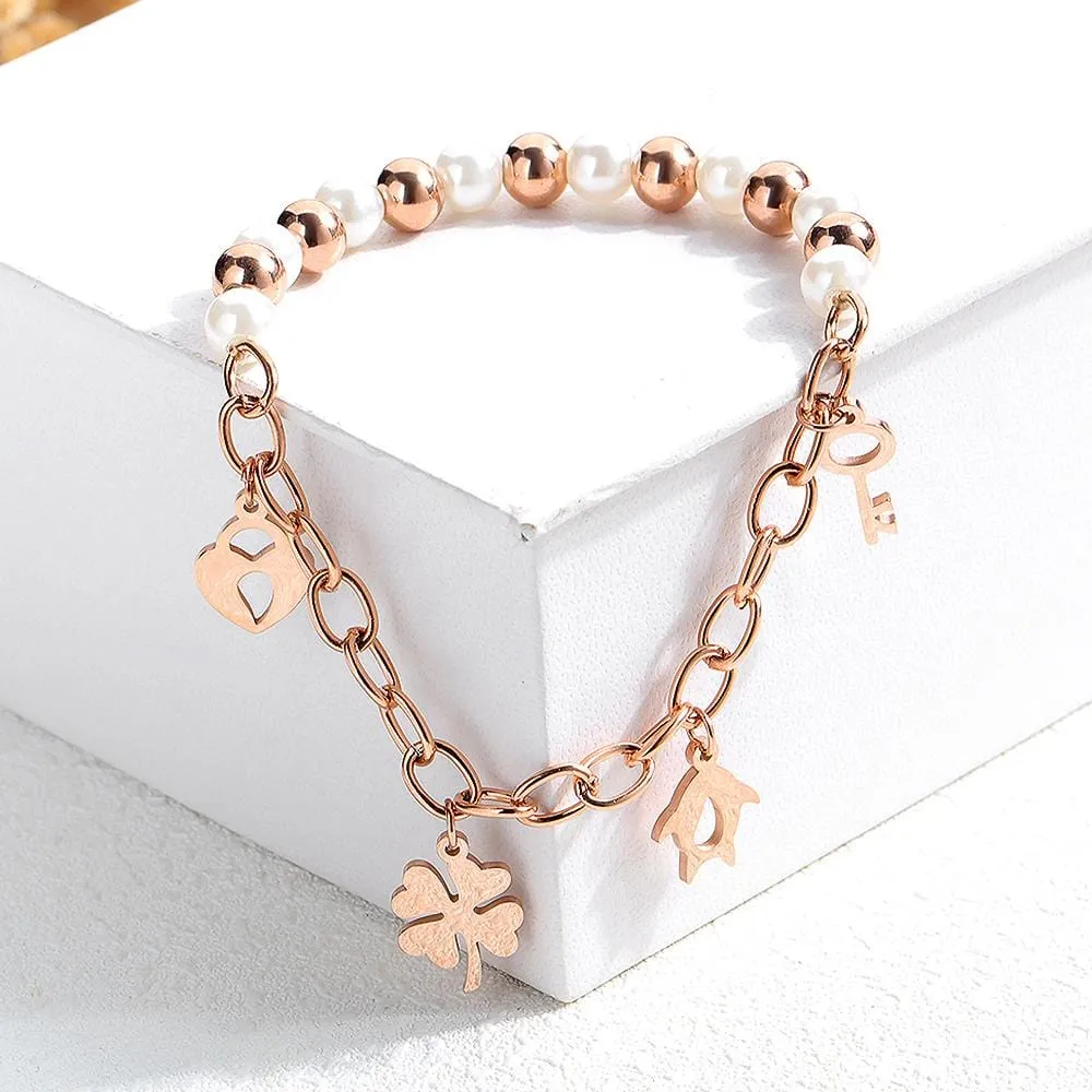 Boxed 18ct Rose Gold Charm Bracelet and Butterfly Earrings Set