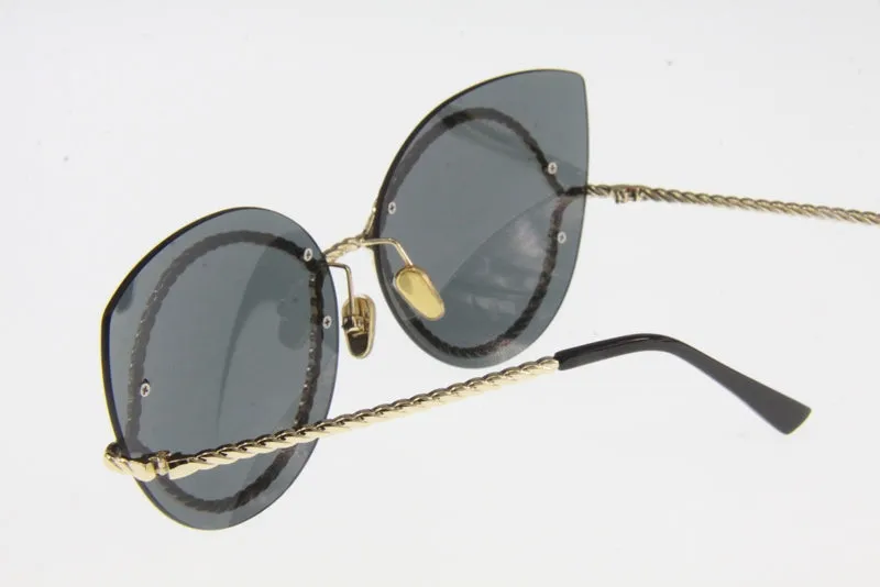 Cat Eye Sunglasses with twisted metal frame