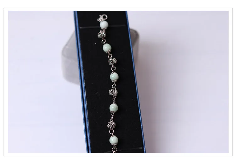 Fashionable and simple bohemian porcelain bead bracelet, alloy rose collocation, exquisitely hand-woven