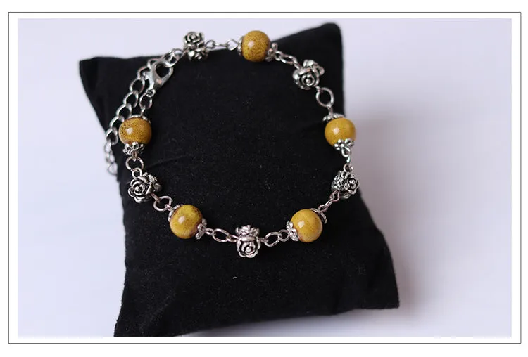 Fashionable and simple bohemian porcelain bead bracelet, alloy rose collocation, exquisitely hand-woven