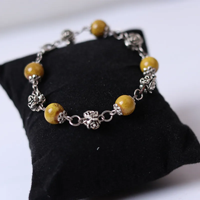 Fashionable and simple bohemian porcelain bead bracelet, alloy rose collocation, exquisitely hand-woven