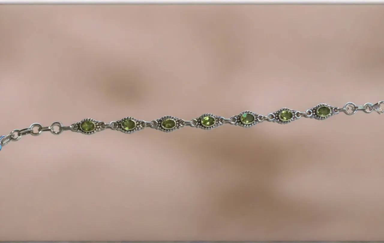 Sterling Silver Bali Style Oval Peridot Bracelet